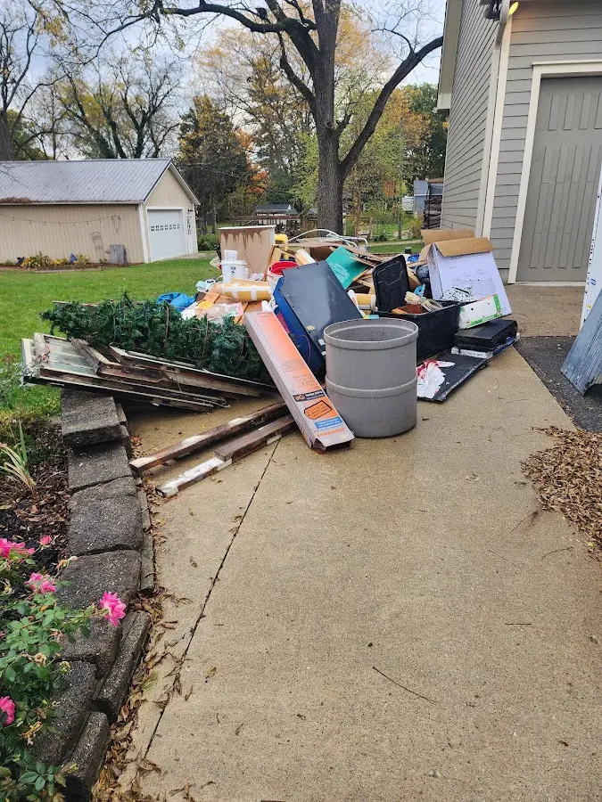 Dumpster being loaded with debris for 30 Yard Dumpster Rental in North Lauderdale